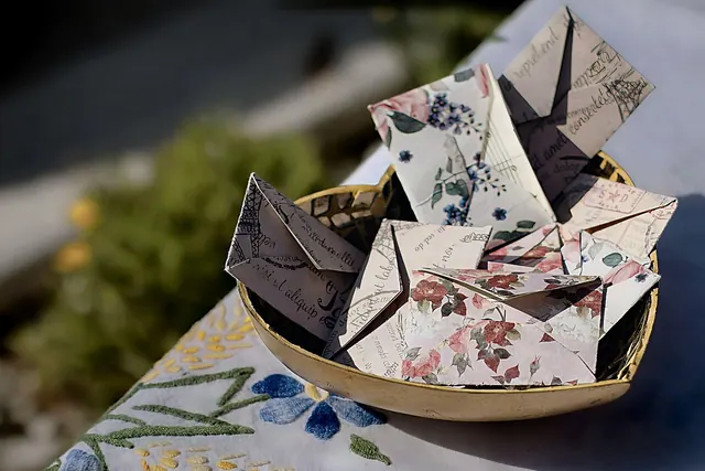 origami, letters, handmade, decorative paper, floral design, vintage paper, creative, diy, craft, folded paper, art project, stationery, envelope, romantic, pastel colors, textured