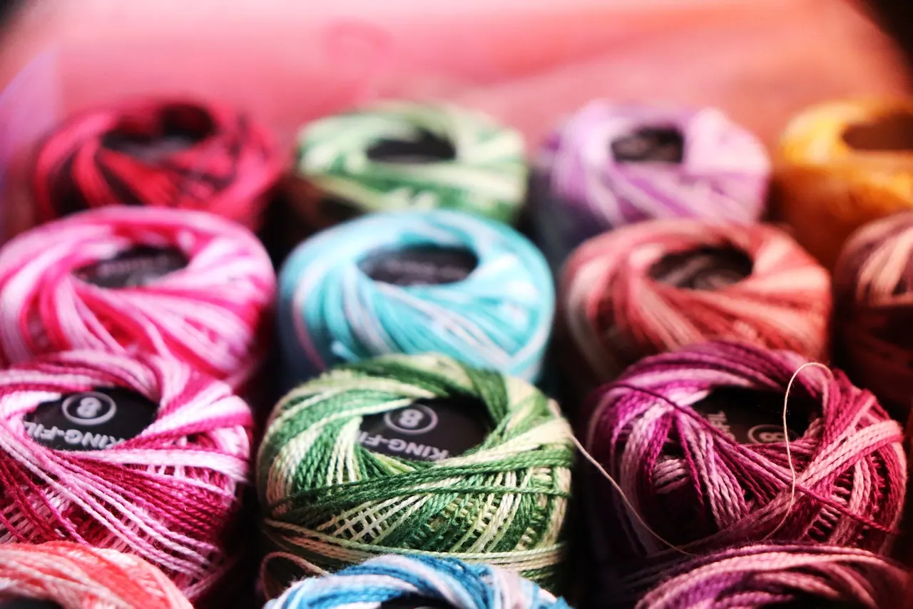 embroidery thread, colorful yarn, crochet, knitting, craft supplies, handmade, needlework, textile art, vibrant colors, yarn balls, sewing, embroidery, thread spools, hobby, diy cr