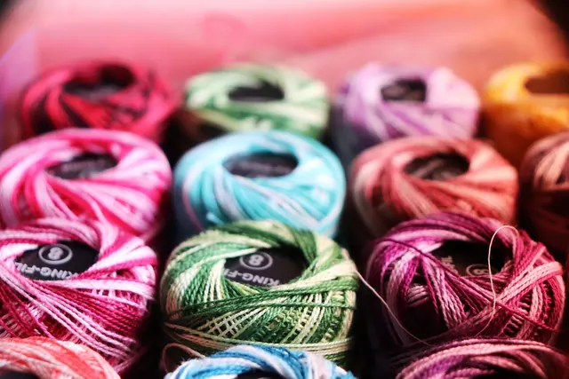 embroidery thread, colorful yarn, crochet, knitting, craft supplies, handmade, needlework, textile art, vibrant colors, yarn balls, sewing, embroidery, thread spools, hobby, diy cr