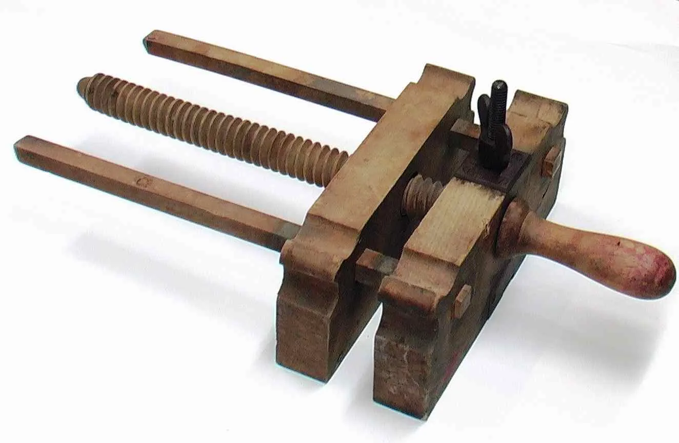Wooden plough. Two pieces of wood joined together by central wooden screw. Plough has metal groove in which the blade would sit. Accession Number: SH.2009.357 The plough is used for trimming the edges of books. The guillotine has largely superseded this method on account of the greater output, speed. Bindery equipment lists: they reveal more about bookbinding projects than a portfolio